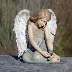 from the beloved Josephs Studio Collection, this sweet angel sits quietly with a bluebird at her side. Resin/Stone mix. Gift Boxed. ??9.75"H X 8.5"L X 8.5"W